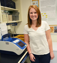 Hannah Jesberger often works with a PCR machine that copies DNA.